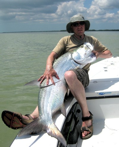 Phil does something unspeakable to a huge Floridian tarpon, which looks to be a low double, at least